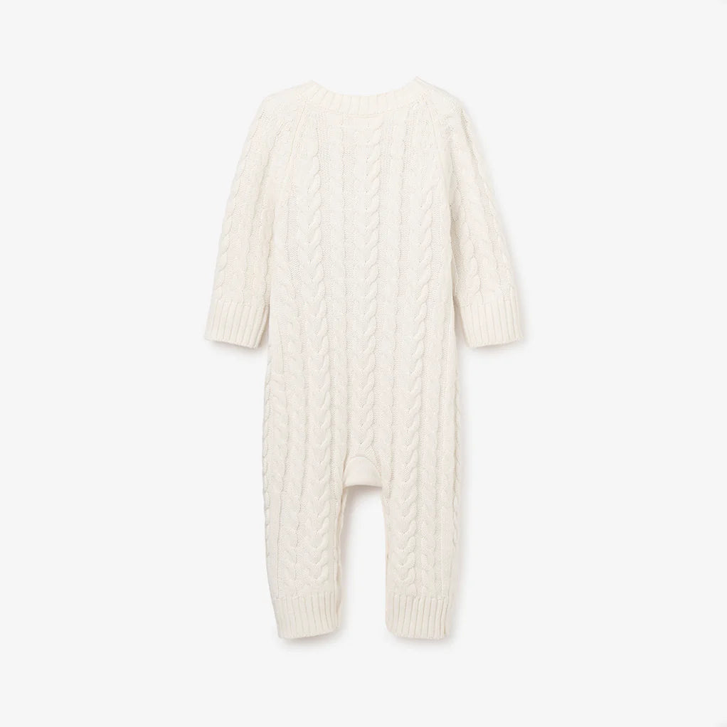 WHISPER WHITE HORSESHOE CABLE KNIT BABY JUMPSUIT