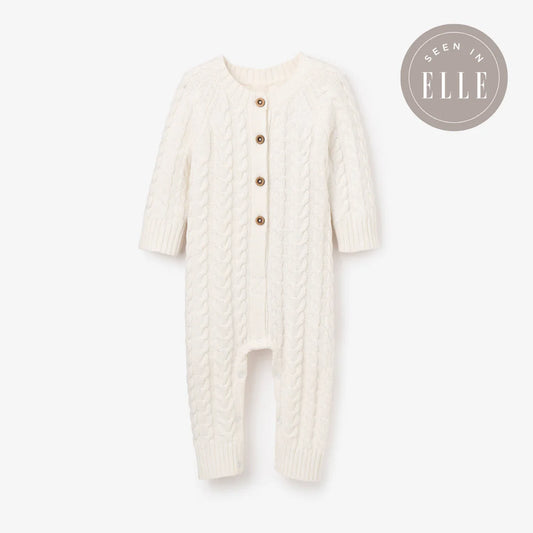 WHISPER WHITE HORSESHOE CABLE KNIT BABY JUMPSUIT